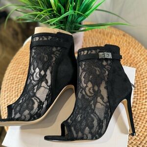 Nine West. Size 7M. Black Lace and Suede Heels. Brand New. Never worn! In box.